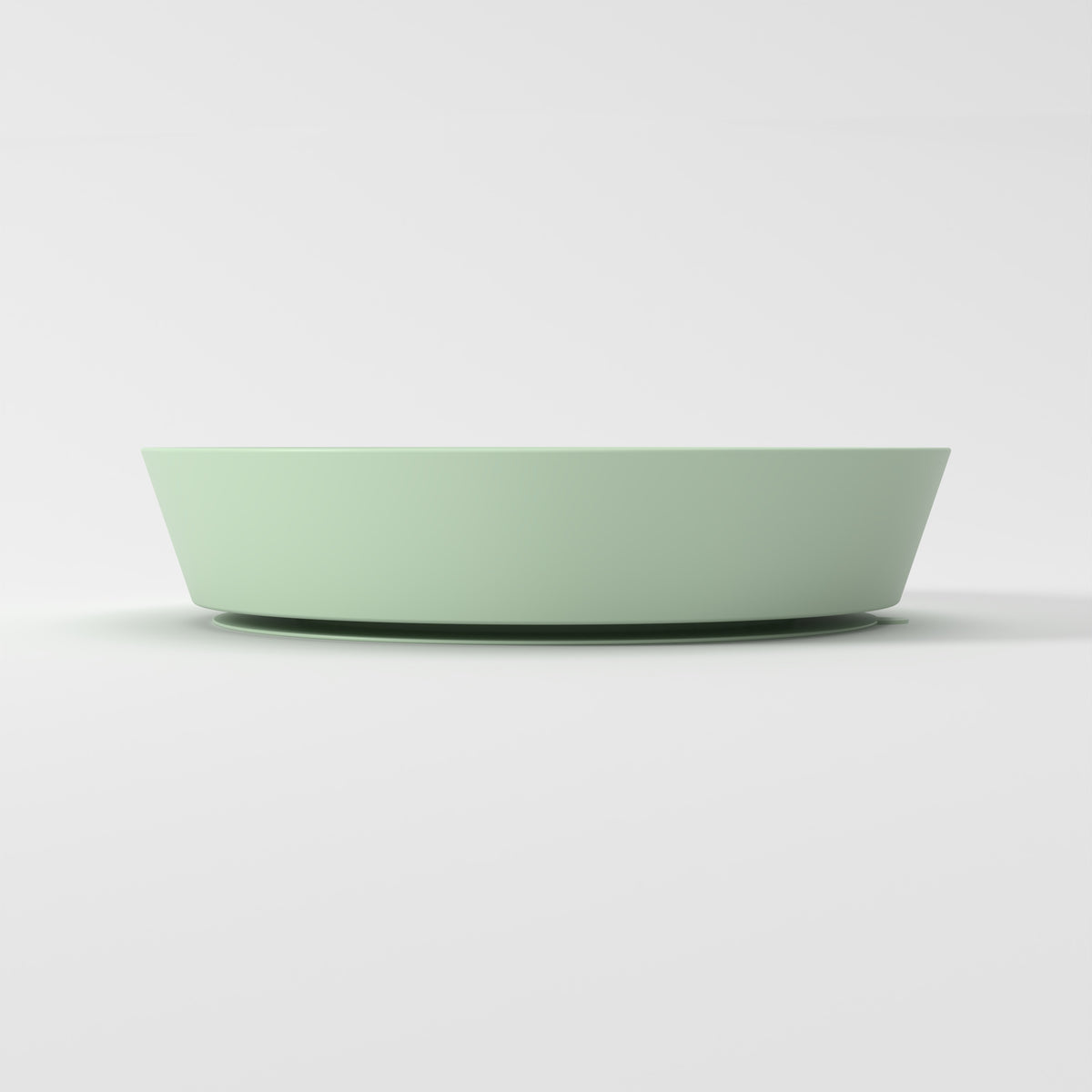 Medium Green Flower + Leaf slow feeder bowl, empty side studio view