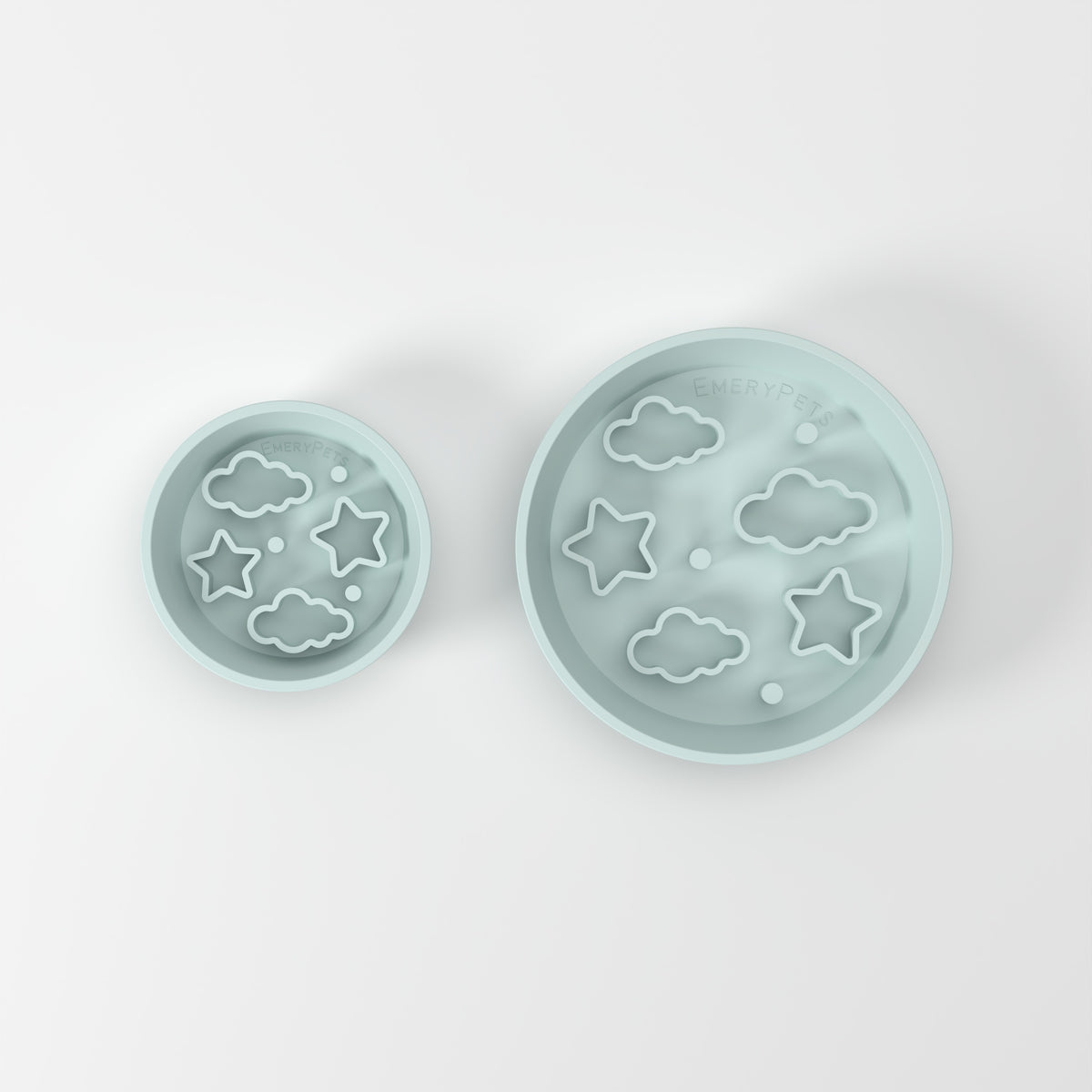 Small and Medium Blue Star + Cloud slow feeder bowls, size comparison top-down studio view