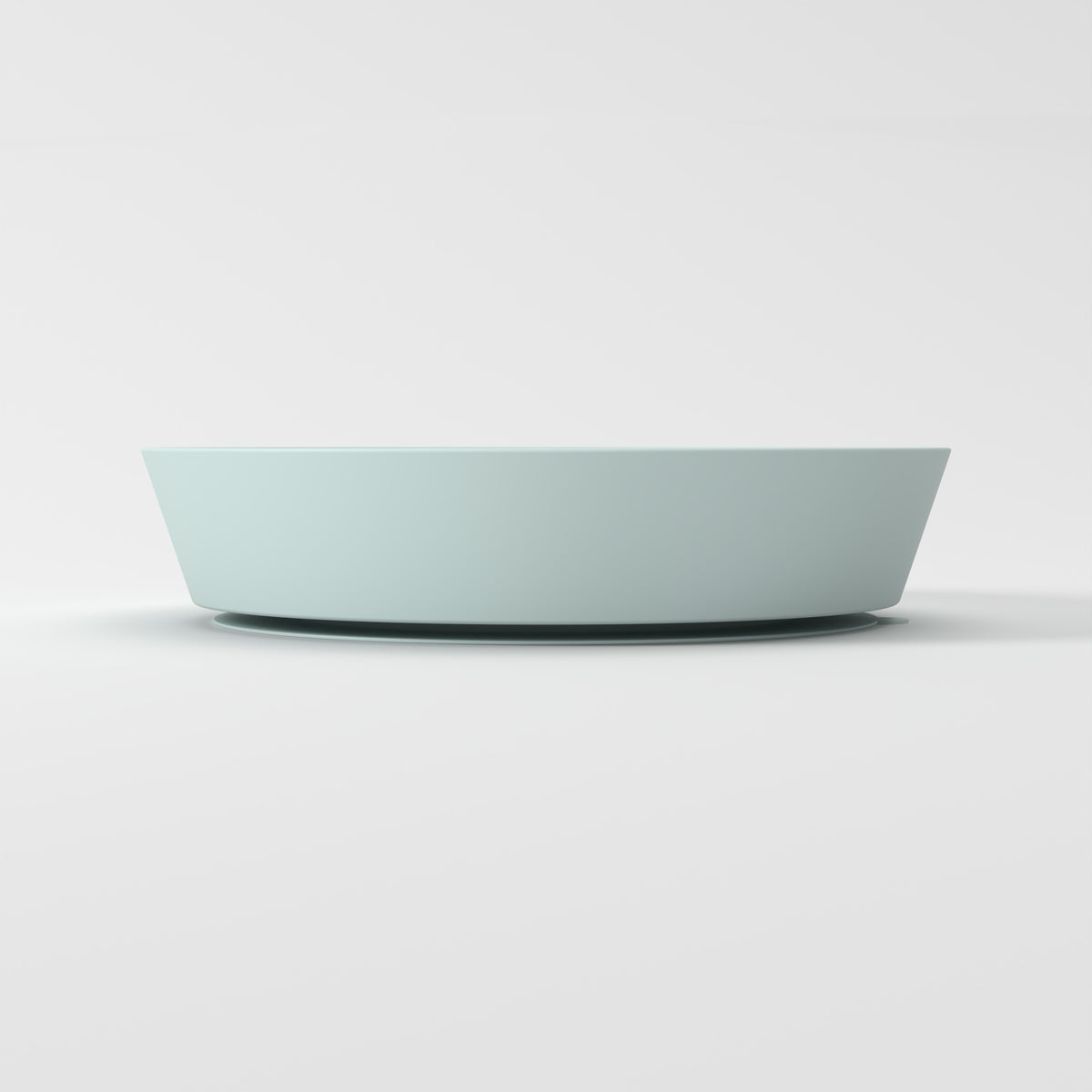Medium Blue Star + Cloud slow feeder bowl, empty side studio view