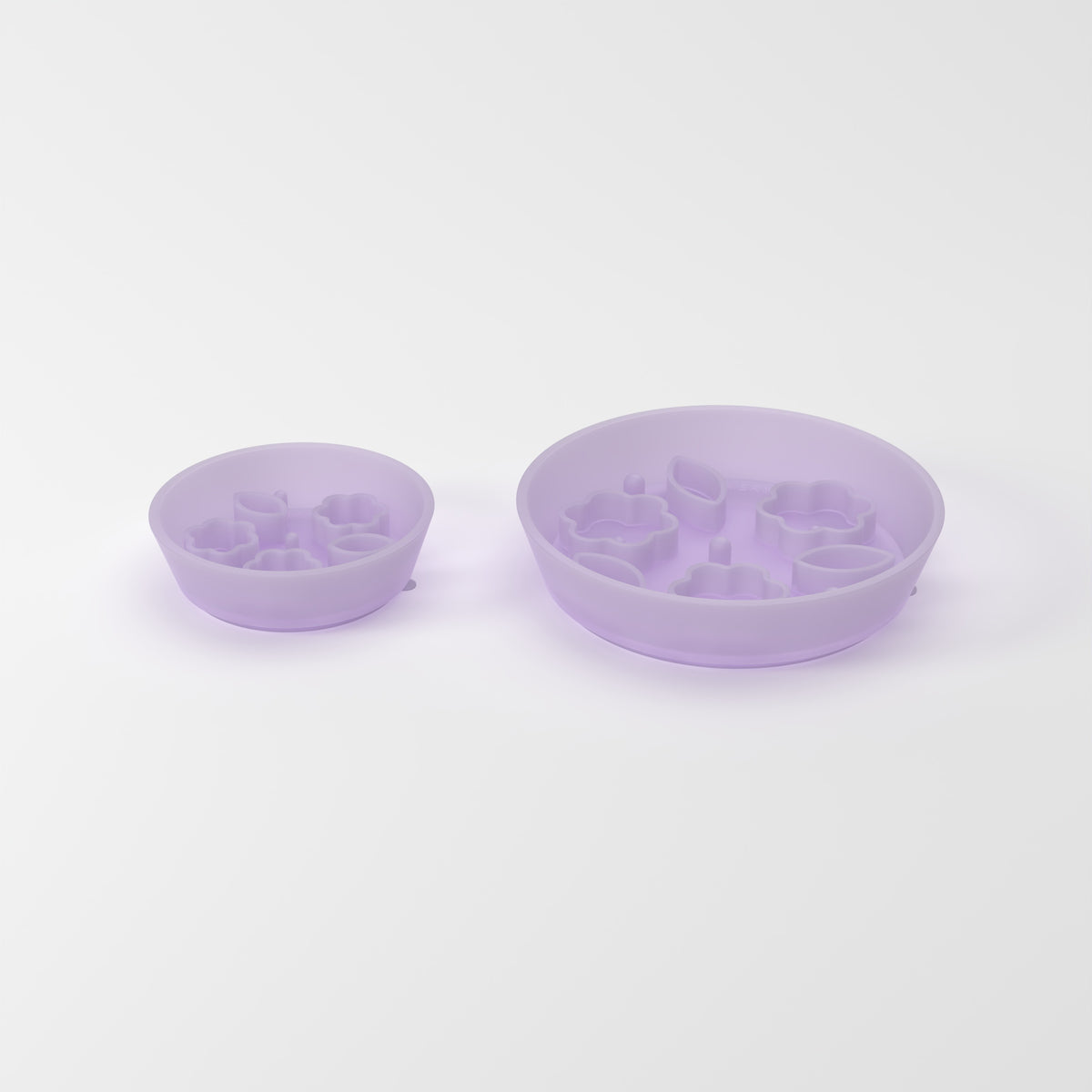 Small and Medium Jelly Purple Flower + Leaf slow feeder bowls, size comparison three-quarter studio view