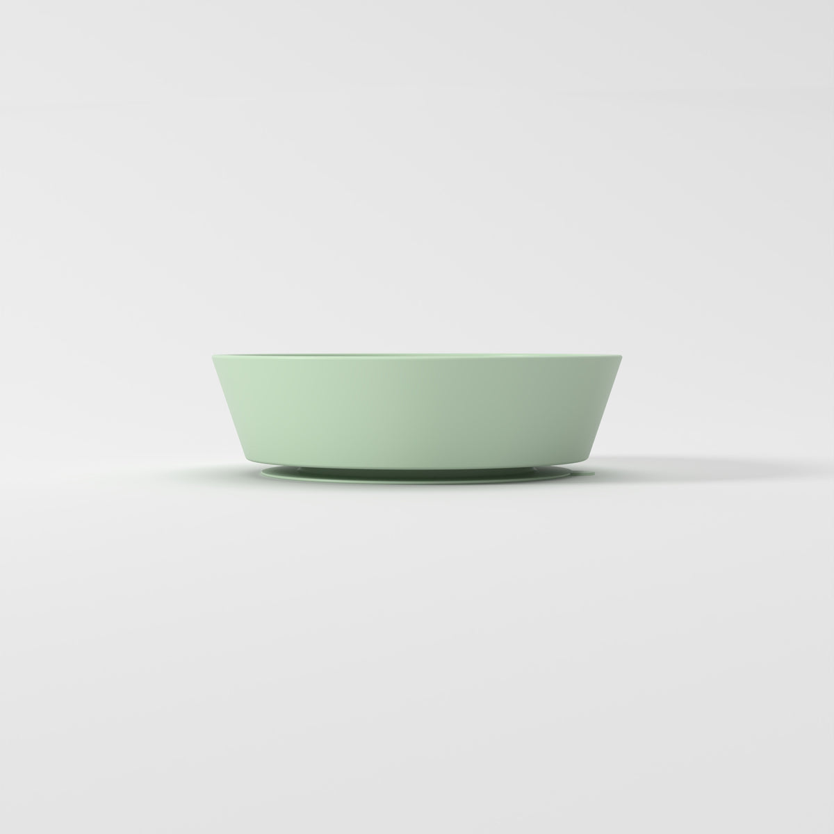 Small Green Flower + Leaf slow feeder bowl, empty side studio view
