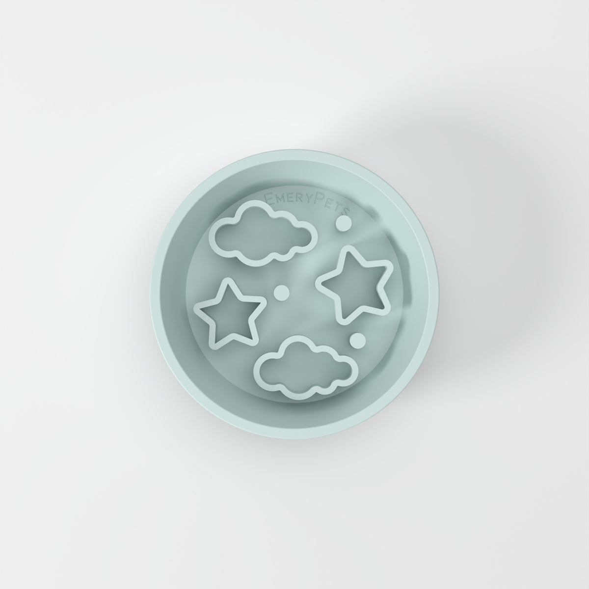Small Blue Star + Cloud slow feeder bowl, empty top-down studio view