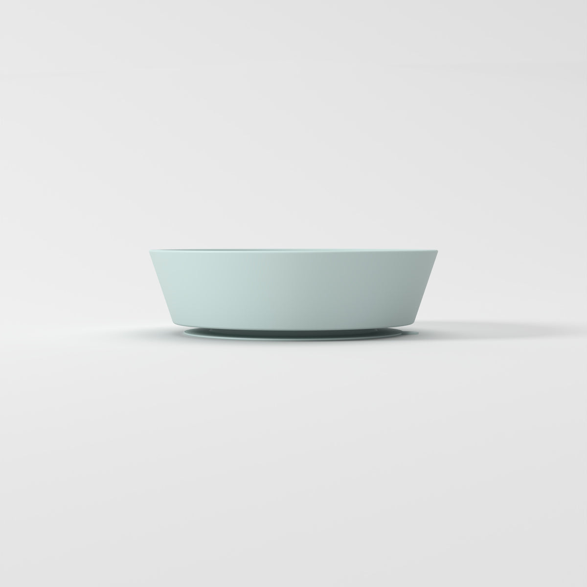 Small Blue Star + Cloud slow feeder bowl, empty side studio view