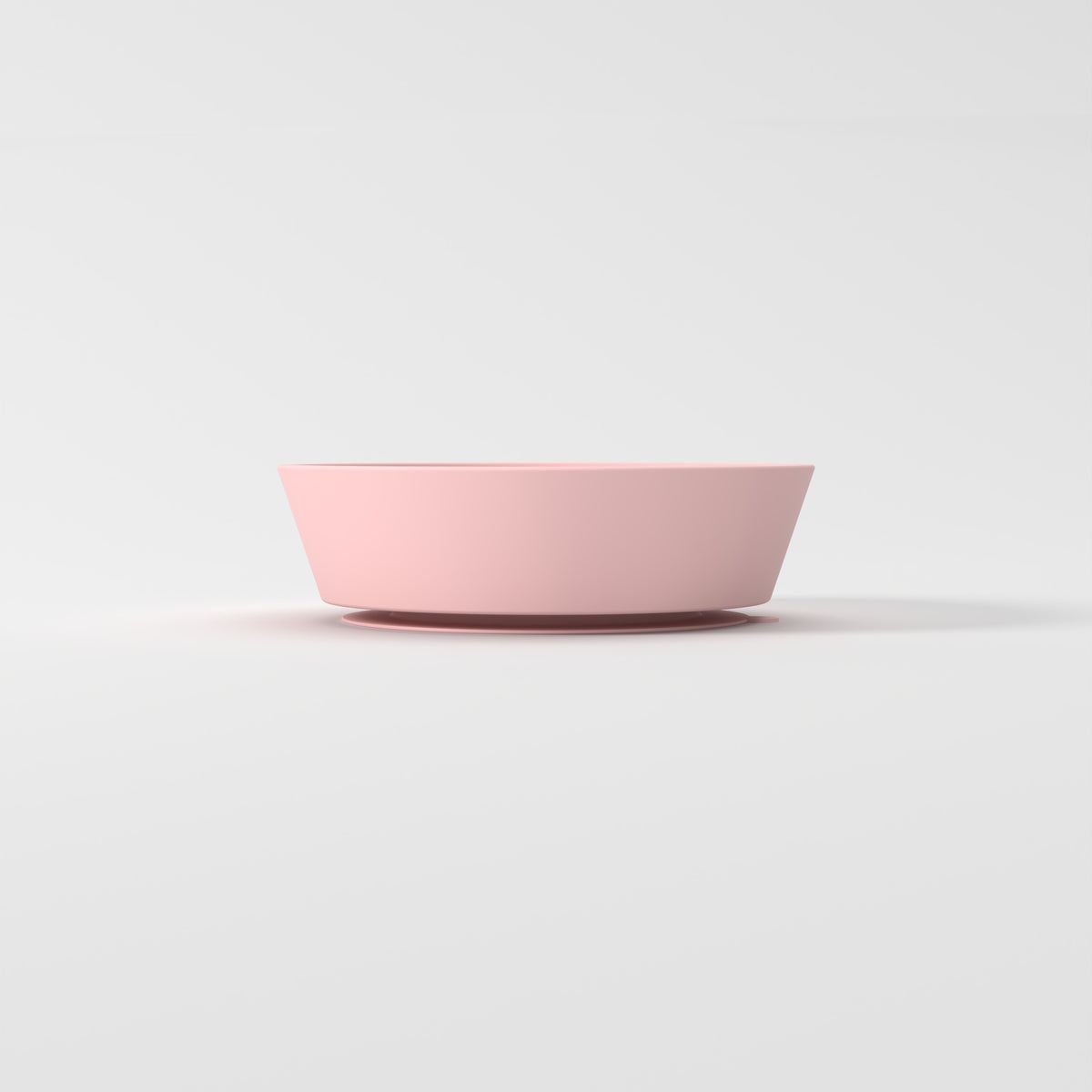 Small Pink Star + Cloud slow feeder bowl, empty side studio view