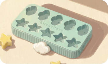 Mint Star and Cloud treat mold on a sunlit cream surface