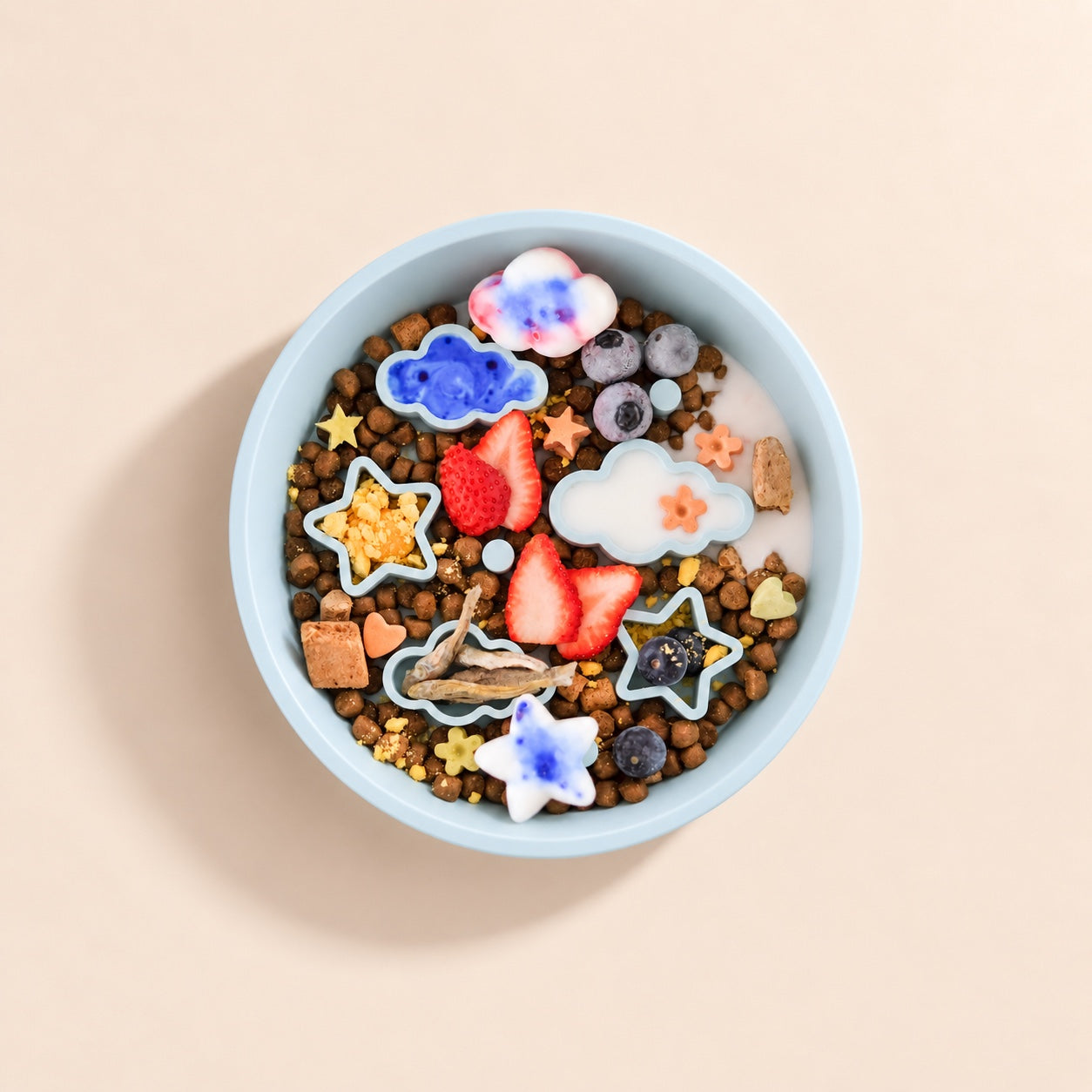 Star + Cloud Slow Feeder Bowls (Blue) with a variety of food and treats